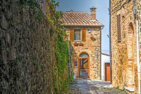 Narrow backstreet in Montalcino, Italyの写真素材