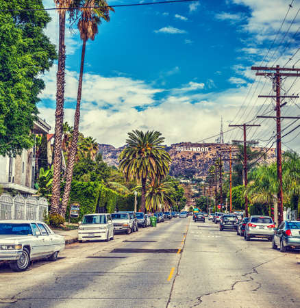 LOS ANGELES, CALIFORNIA - OCTOBER 28, 2016: Hollywood sign seen from a picturesque streetのeditorial素材