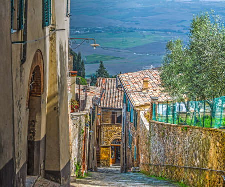 Narrow street in Montalcino, Italyの写真素材