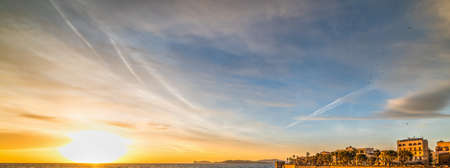 Shining sun in Alghero at sunset, Sardiniaの写真素材