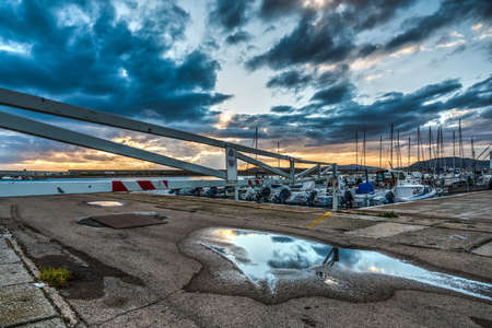 Barrier in Alghero harbor, Sardiniaの写真素材