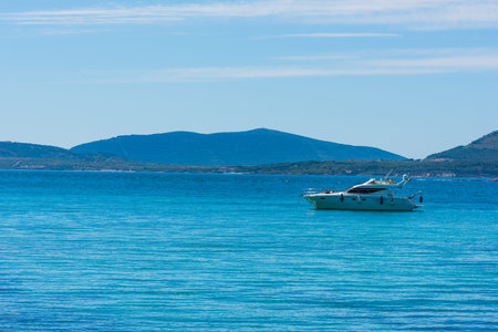 yacht alone in the blue sea on a spring dayの写真素材