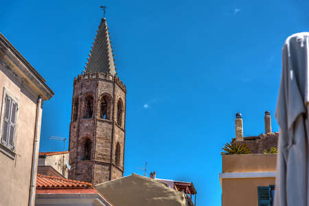 Duomo Steeple on a clear day in Alghero, Sardiniaの写真素材