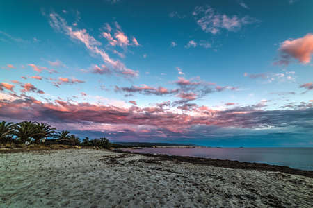 Pink sunset in Alghero shoreline. Sardinia, Italyの写真素材