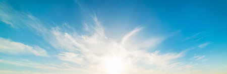 blue sky with white, soft clouds