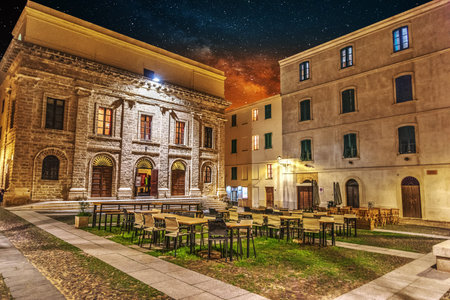 Starry sky over Piazza del Teatro in Alghero at night, Italyの写真素材