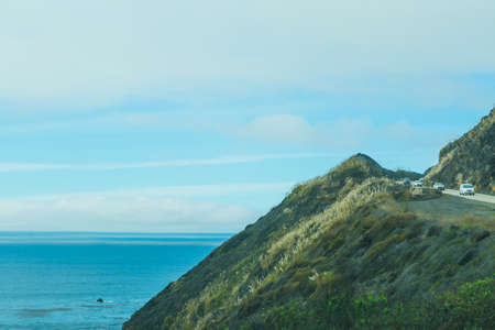Cloudy sky over Pacific Coast Highway in Central California, USAの写真素材