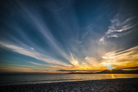 Dark sunset in Alghero shoreline. Sardinia, Italy
