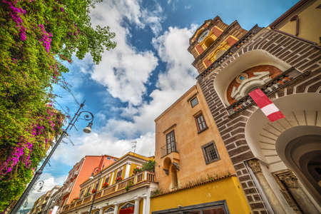 Duomo steeple under a cloudy sky in Sorrento. Campania, Italyの写真素材