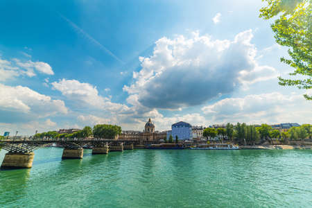 Institut de France seen from Seine river on a cloudy day. Paris, Franceの写真素材