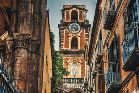 Duomo steeple seen through a narrow alley in old town Sorrento, Italyのeditorial素材