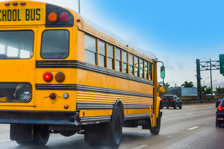 School bus on the highway in Miami. Florida, USA