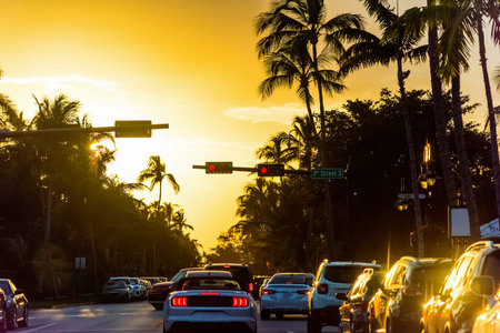 Driving in Naples under a shining sun at sunset. Florida, USA