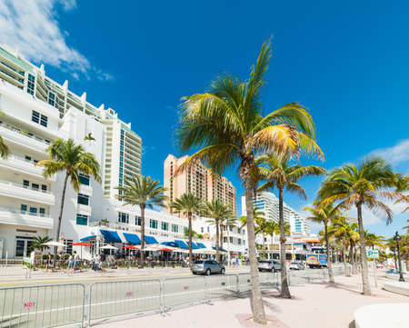 Fort Lauderdale, USA - February 22, 2019: People walking on Fort Lauderdale seafront on a sunny dayのeditorial素材
