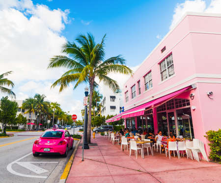Miami Beach, USA - February 19, 2019: Volkswagen New Beetle parked by Big Pink bar in South Beachのeditorial素材