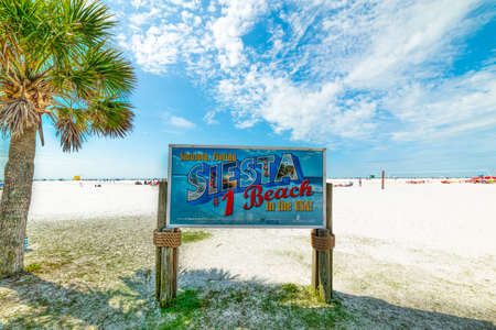 Sarasota, USA - February 25, 2019: Siesta Beach sign on a clear dayのeditorial素材