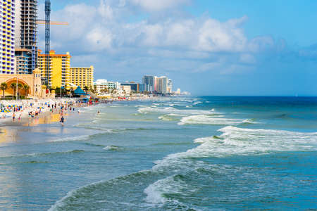 Daytona Beach, USA - February 23, 2019: People at the beach on a cloudy dayのeditorial素材