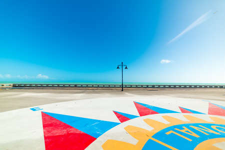 Key West, USA - February 20, 2019: detail of Edward B Night pier windrose on a sunny dayのeditorial素材