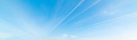 Contrails and blue sky in Sardiniaの写真素材