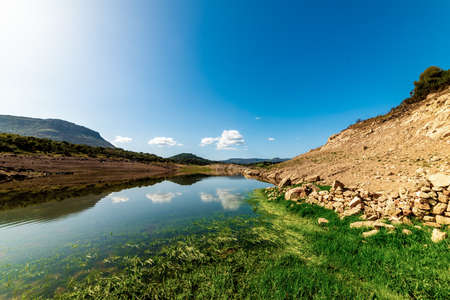 Reflections in Temo lake. Sardinia, Italyの写真素材
