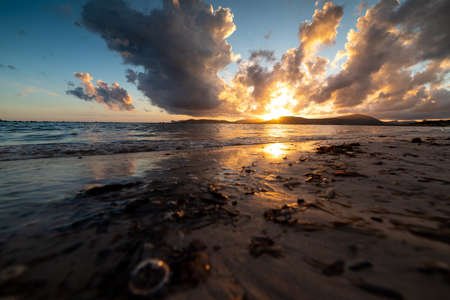 Dark clouds over Alghero sea at sunset. Sardinia, Italyの写真素材