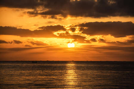 Sun shining over Alghero shore at sunset. Sardinia, Italyの写真素材