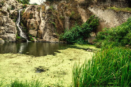 Triulintas waterfall surrounded by vegetation. Sardinia, Italyの写真素材