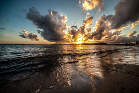 Dramatic sky over Alghero sea at sunset. Sardinia, Italyの写真素材