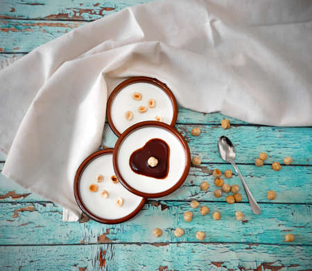 Italian dessert panna cotta with hazelnuts and caramelの写真素材