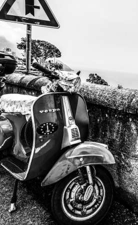 Positano, ITA - May 24, 2018: Close up of a Vespa scooter parked in Positano seafrontのeditorial素材