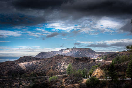 Los Angeles, CA, USA - October 28, 2016: Hollywood sign under dark cloudsのeditorial素材