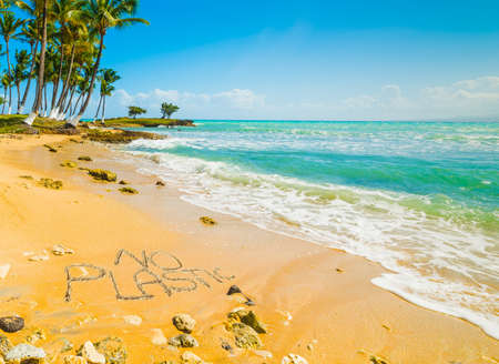 No Plastic written on a beautiful tropical beach in the Caribbean seaの写真素材
