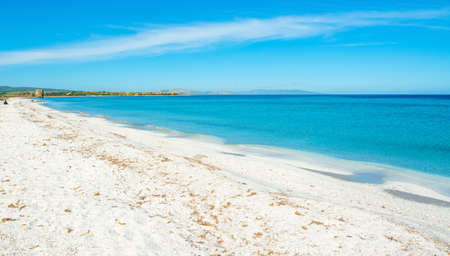 White pebbles and blue sea in Stintino shore. Sardinia, Italyの写真素材