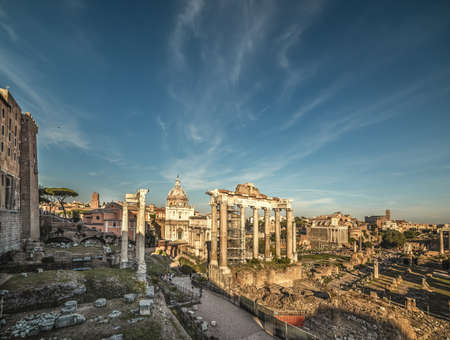 Imperial Fora under a cloudy sky at sunset. Rome, Italyの写真素材