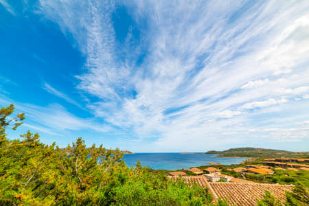 Clouds over Capo Coda Cavallo coastline. Sardinia, Italyの写真素材