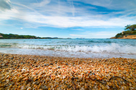 Pebbles by the sea in Costa Smeralda. Sardinia, Italyの写真素材