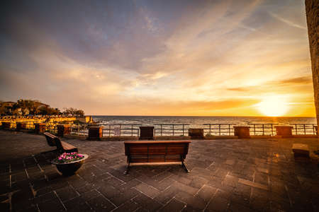 Colorful sunset in Alghero seafront. Sardinia, Italyの写真素材