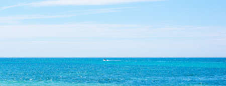 Sailing in the blue sea in springtime. Sardinia, Italyの写真素材