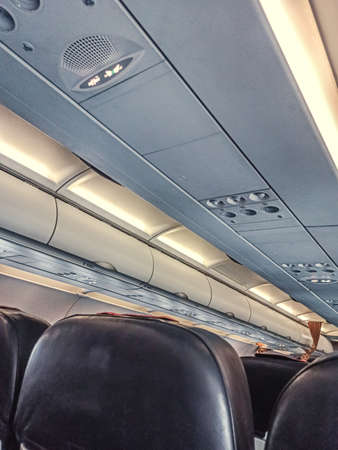 Empty cabin of modern commercial jet airlinerの写真素材