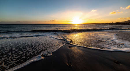 Alghero shore under a clear sky at sunset. Sardinia, Italyの写真素材