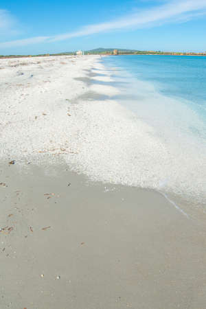 White pebbles and blue sea in Stintino shore. Sardinia, Italyの写真素材