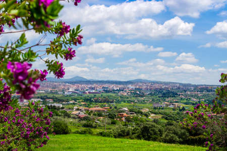 Panoramic view of Sassari under a cloudy sky. Sardinia, Italyの写真素材