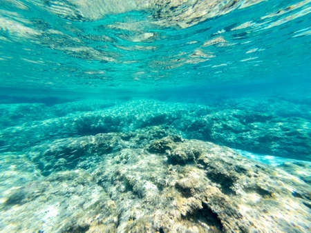 Rocks and turquoise sea in Alghero coast. Sardinia, Italyの写真素材