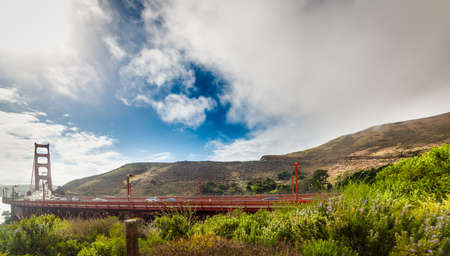 World famous Golden Gate bridge under a cloudy sky. San Francisco, USAの写真素材