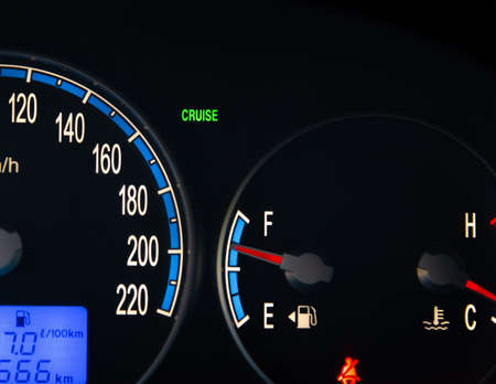 Close up of the cruise control light of a modern SUVの写真素材