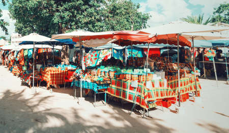 Guadeloupe, FR - February 17, 2019: Stalls in a colorful street market in Sainte Anneのeditorial素材
