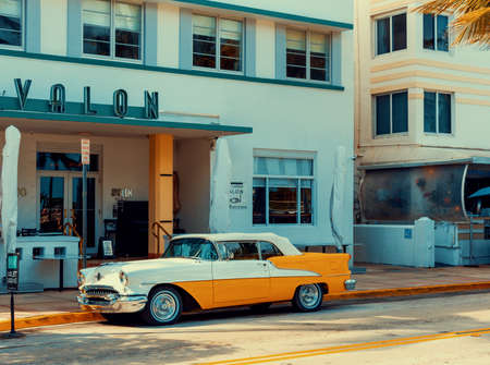 Miami Beach, USA - February 26, 2019: Oldsmobile Rocket 88 parked by famous Avalon Hotel in South Beachのeditorial素材