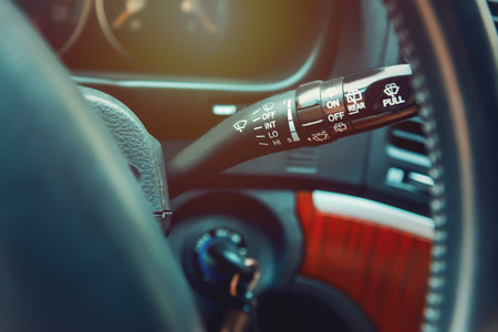 Close up of a windscreen wiper lever of a modern SUV