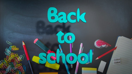 Back to school writing with a chalkboard on the background