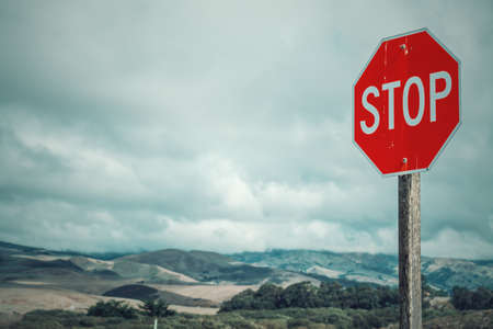 Stop sign under an overcast sky in Central California, USAの写真素材